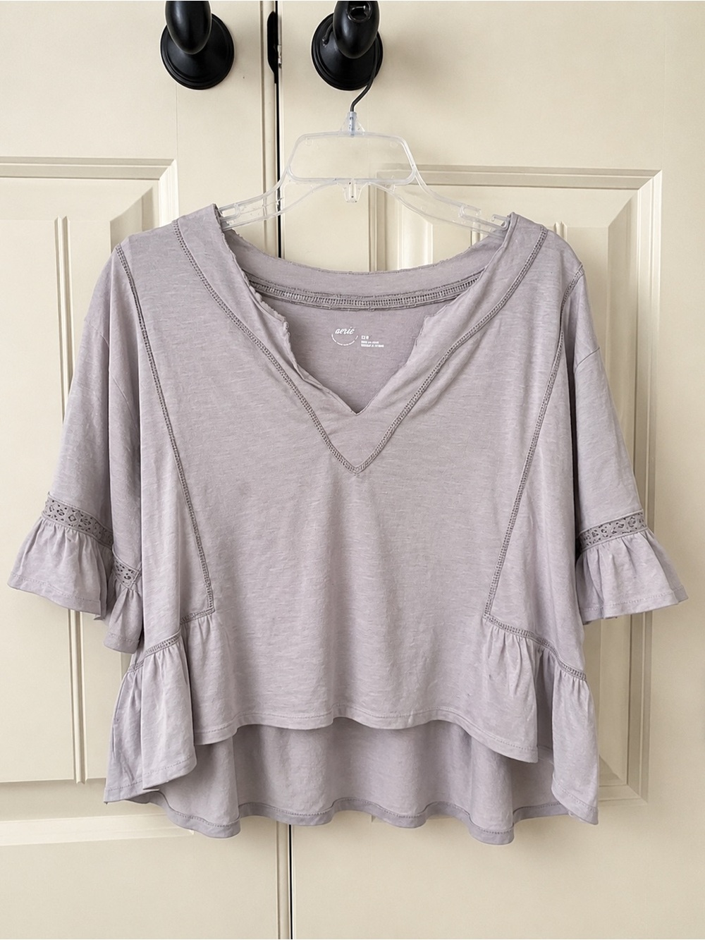 Aerie Flowy Cropped Notch Neck Ruffle Top in tan, size Medium.